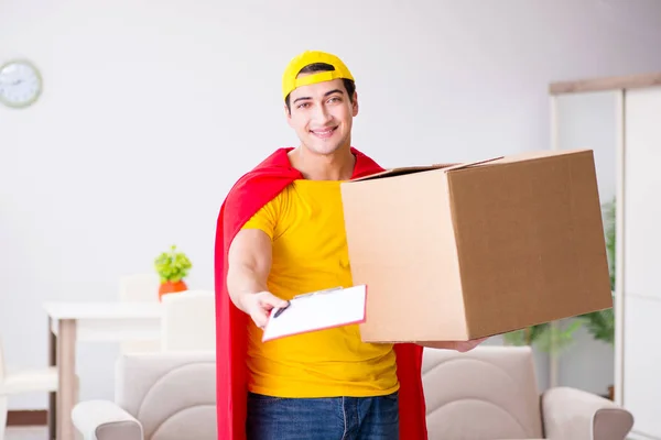 Superhrdina dodávka chlap s krabicí — Stock fotografie