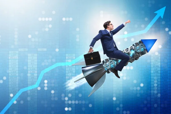 Businessman on rocket in trading concept — Stock Photo, Image