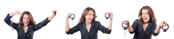 Female businesswoman with handcuffs on white — Stock Photo, Image