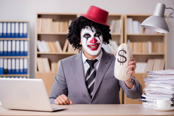 Clown businessman working in the office