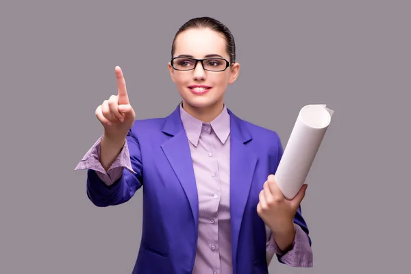 Young woman architect pressing virtual button — Stock Photo, Image