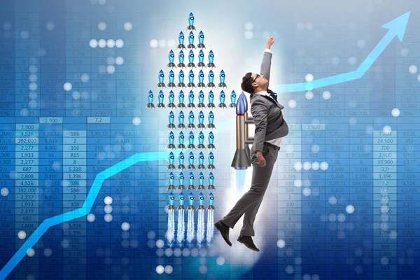 Businessman on rocket in trading concept — Stock Photo, Image