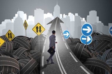 Businessman in uncertainty concept on road intersection crossroa clipart