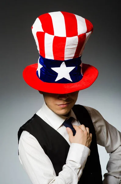 Man wearing hat with american symbols