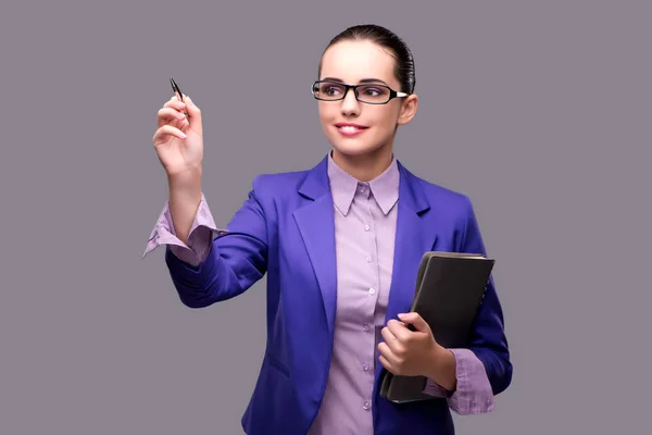 Businesswoman pressing virtual button with pen — Stock Photo, Image