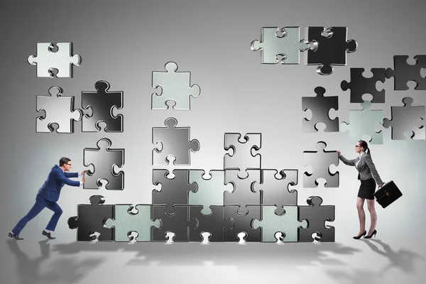 Concetto aziendale di lavoro di squadra con pezzi puzzle — Foto Stock