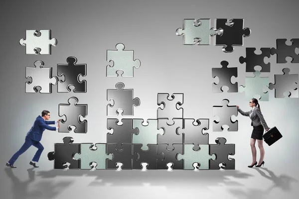 Business concept of teamwork with puzzle pieces