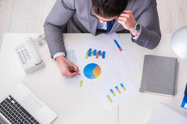 View from top on businessman working on business charts — Stock Photo, Image