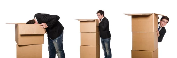 Hombre divertido con cajas aisladas en blanco — Foto de Stock