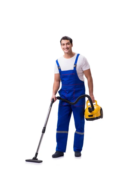 Man in overall doen vacuüm reiniging op wit — Stockfoto