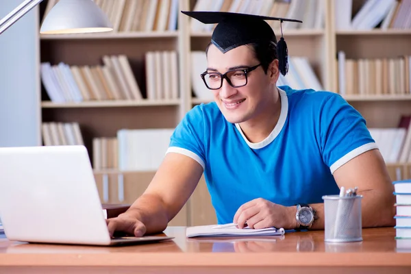 Young man graduating from university — Stock Photo, Image