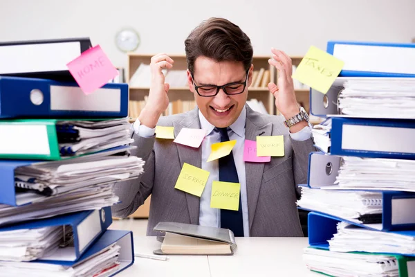 Businessman struggling with multiple priorities — Stock Photo, Image