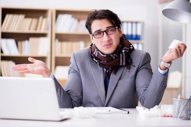 Hasta iş adamı ofiste.