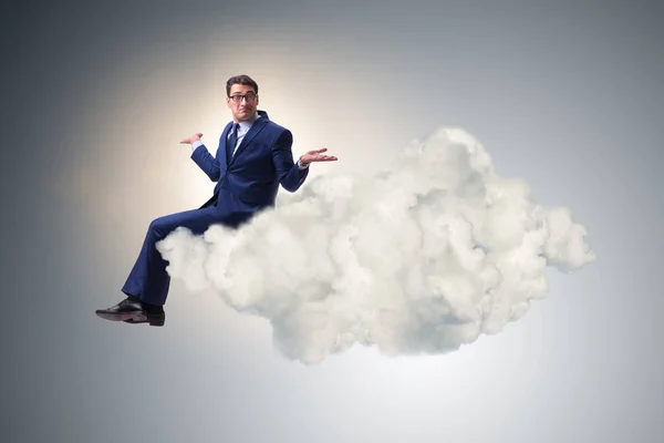Üzletember ül a felhőn a motiváció koncepció — Stock Fotó