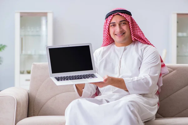 Arab businessman working sitting at couch — Stock Photo, Image