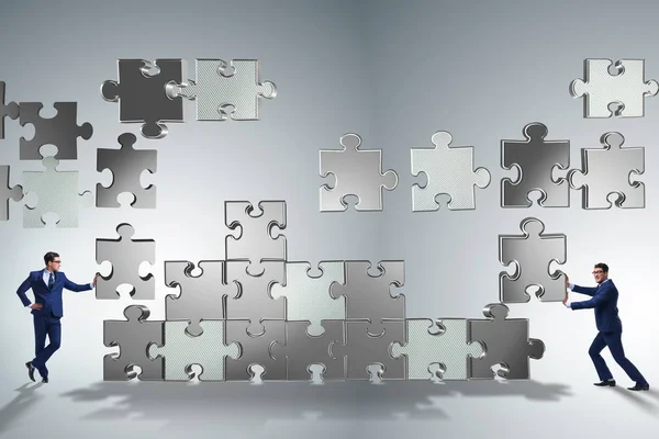 Business concept of teamwork with puzzle pieces — Stock Photo, Image