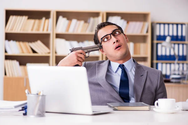 Angry businessman working in the office Stock Picture