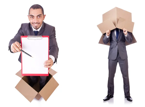 Uomo d'affari in piedi nella scatola isolato su bianco — Foto Stock