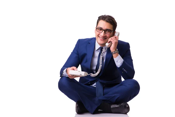 Homme d'affaires assis sur le sol isolé sur blanc — Photo