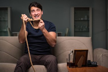 İntiharı düşünen umutsuz bir adam.