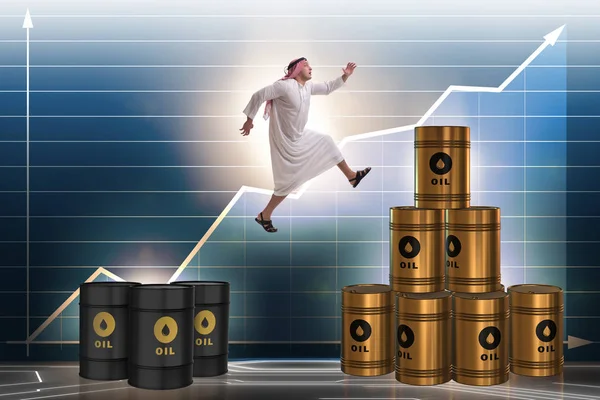 Arabský obchodník skákat z barelů ropy — Stock fotografie