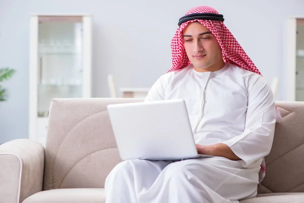 Arab businessman working sitting at couch — Stock Photo, Image