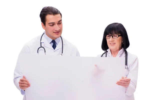 Due medici isolati sullo sfondo bianco — Foto Stock