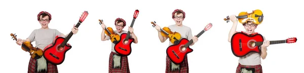 Escocés divertido con instrumento musical aislado en blanco — Foto de Stock