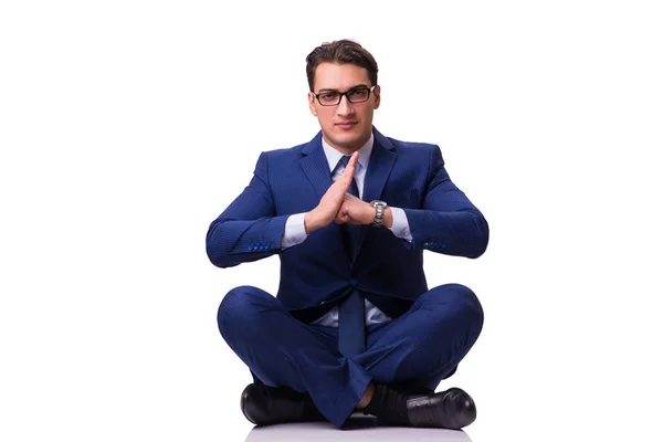 Affärsman som sitter på golvet isolerat på vit — Stockfoto