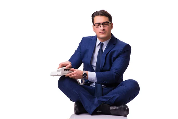 Biznesmen medytuje na piętrze, na białym tle — Zdjęcie stockowe