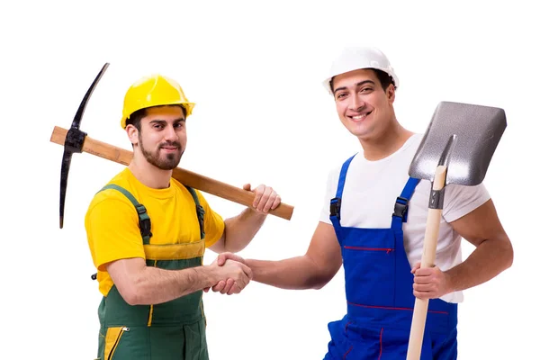 Dos trabajadores aislados sobre el fondo blanco — Foto de Stock