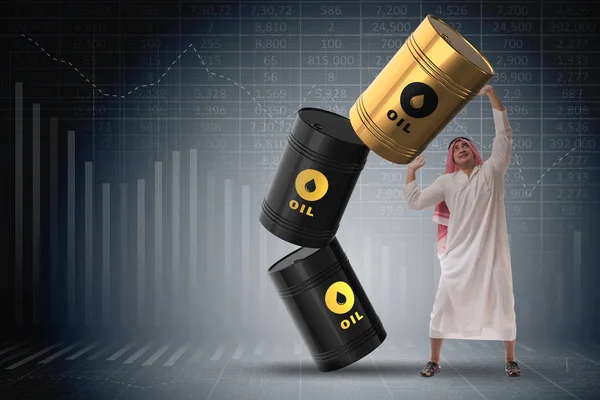 Empresario árabe sosteniendo barril de petróleo —  Fotos de Stock