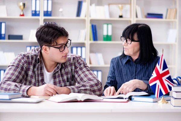 Young foreign student during english language lesson