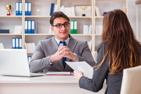 Business meeting between businessman and businesswoman — Stock Photo, Image