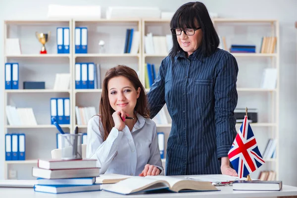 Young foreign student during english language lesson — Stock Photo, Image