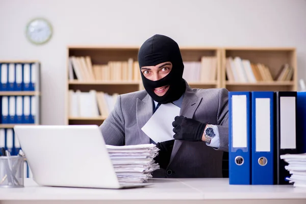 Criminal businessman with balaclava in office — Stock Photo, Image