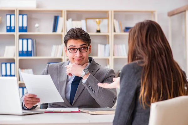 Business meeting between businessman and businesswoman — Stock Photo, Image