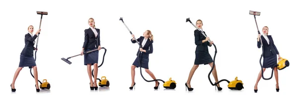 Businesswoman cleaning with vacuum cleaner on white — Stock Photo, Image