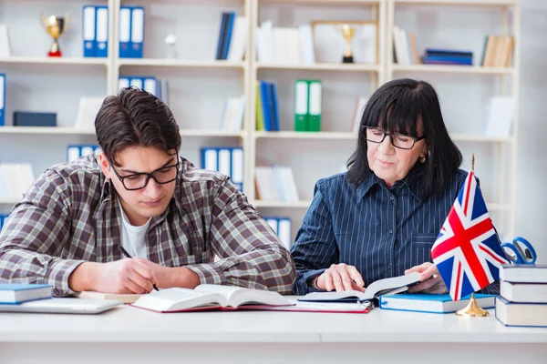 Young foreign student during english language lesson