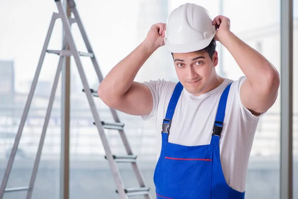 Young worker with safety helmet hardhat — Stock Photo, Image