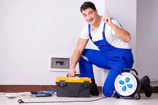 Man doing electrical repairs at home