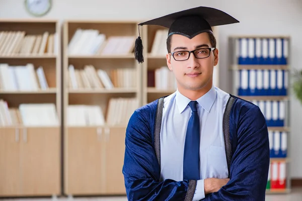 Young man graduating from university — Stock Photo, Image