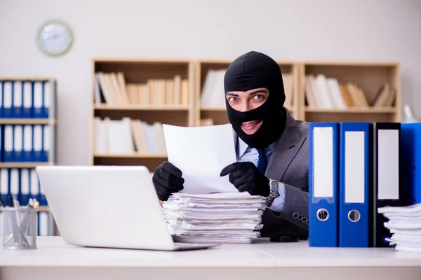 Criminal businessman with balaclava in office — Stock Photo, Image