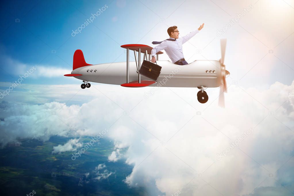 Businessman flying on vintage old airplane