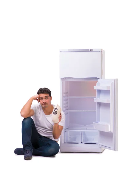 Buzdolabı doldurmak için aç adam para için arıyorsunuz — Stok fotoğraf