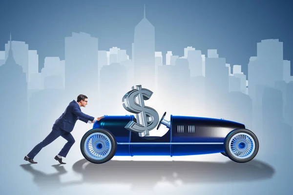 Biznesmen pchanie auta z dollar w siedzenie kierowcy — Zdjęcie stockowe