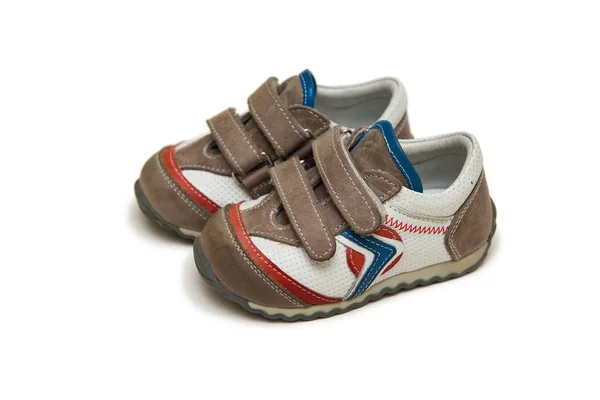 Baby schoenen geïsoleerd op de witte achtergrond — Stockfoto