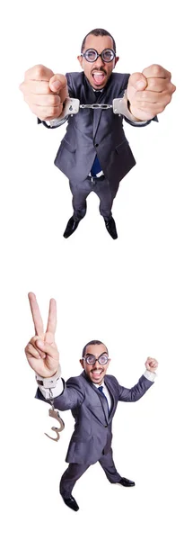 Funny businessman with handcuffs on white Stock Image