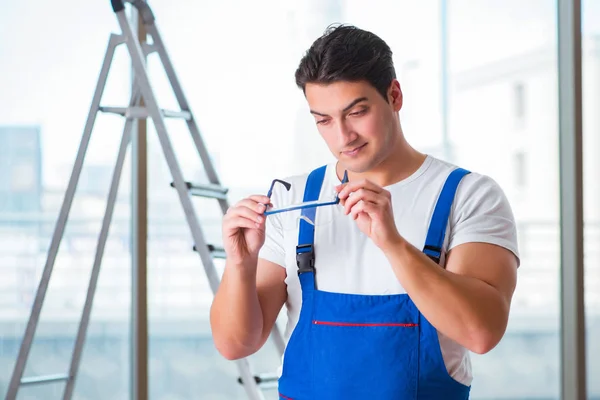 Young worker with safety goggles — Stock Photo, Image