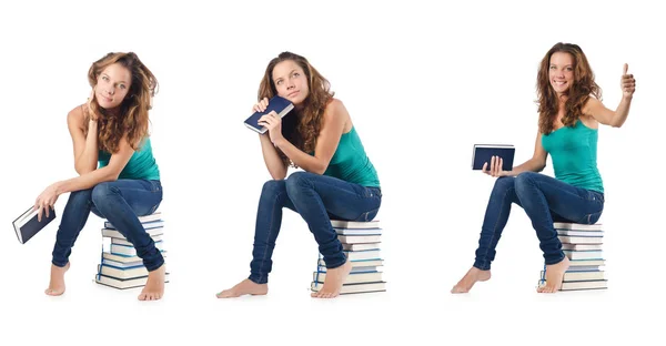 Diák ül egy halom könyvet — Stock Fotó